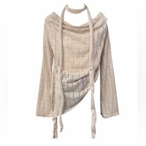 beige asymmetrical distressed "mermaid tail" top